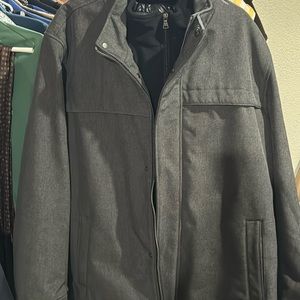 Men’s Dockers winter coat in dark gray. Double zipper and pockets. Worn once